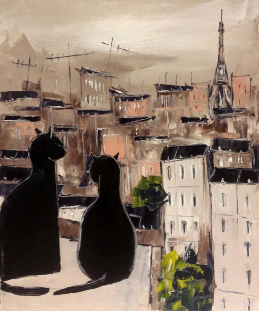 Black cat and his pretty on Paris roofs